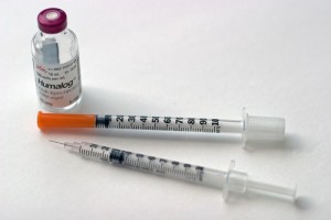 injeção e vidro de insulina